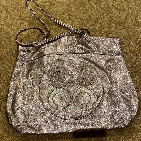 Coach tote iridescent color. Stains in the inside. Comes with dust bag - Picture 1 of 3